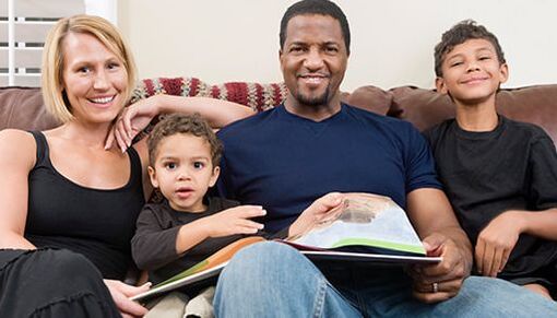 Happy group diverse family enjoying the couch 